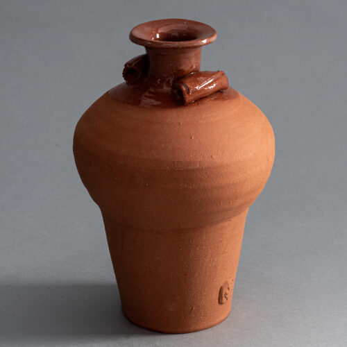 terra cotta vase with rolled arms